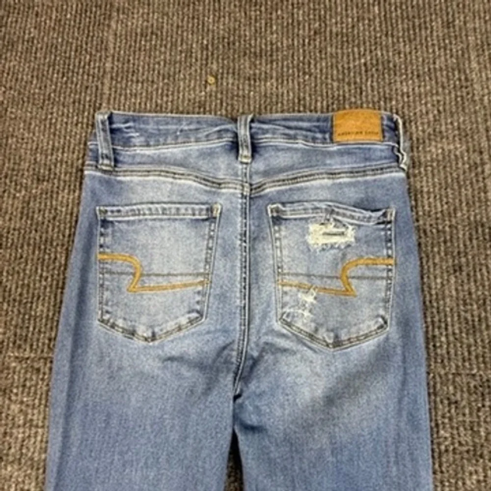 American Eagle Super Hi-Rise Jegging Womens 4 Blue Distressed Next Level Stretch